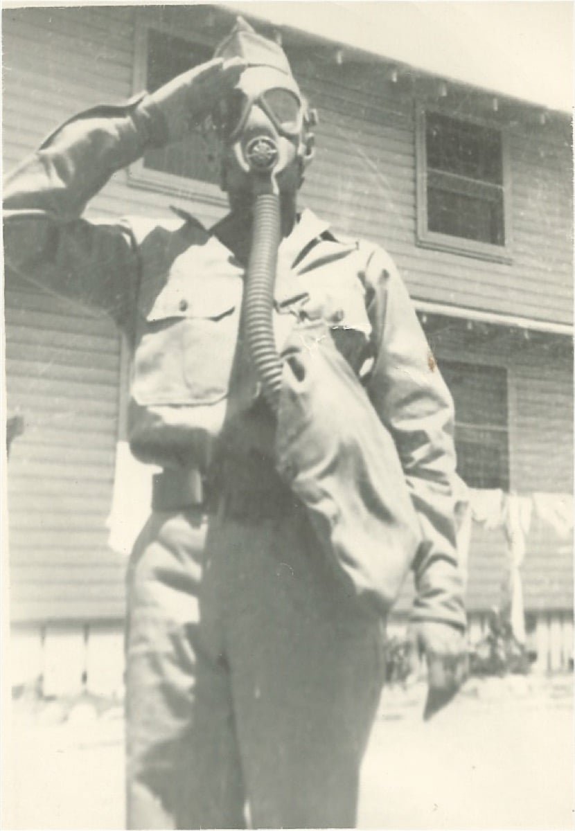 The author's father in a gas mask